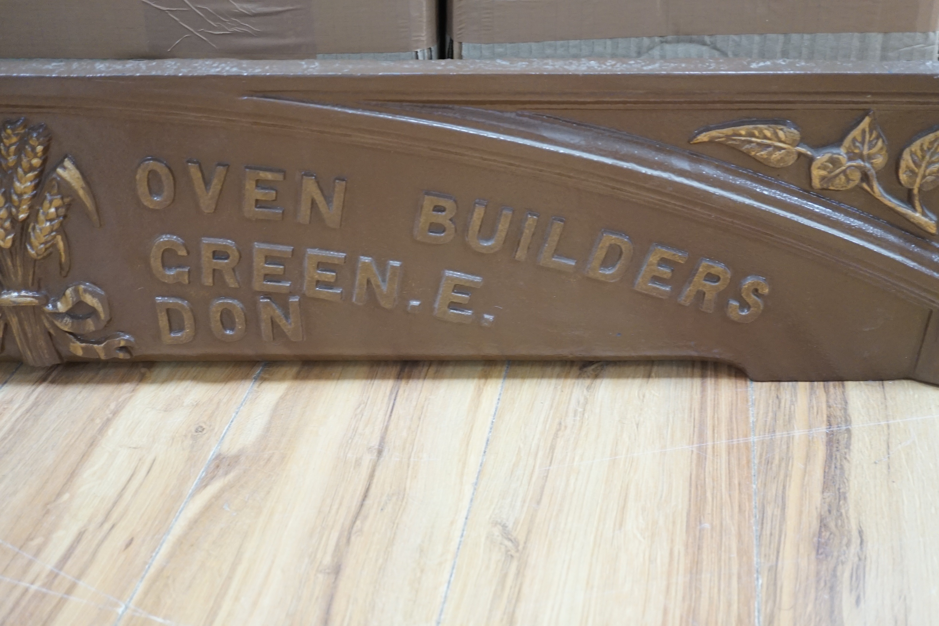 A Kemp & sons, oven builders, Stepney Green, London, cast iron advertising standing panel, 118 cms wide